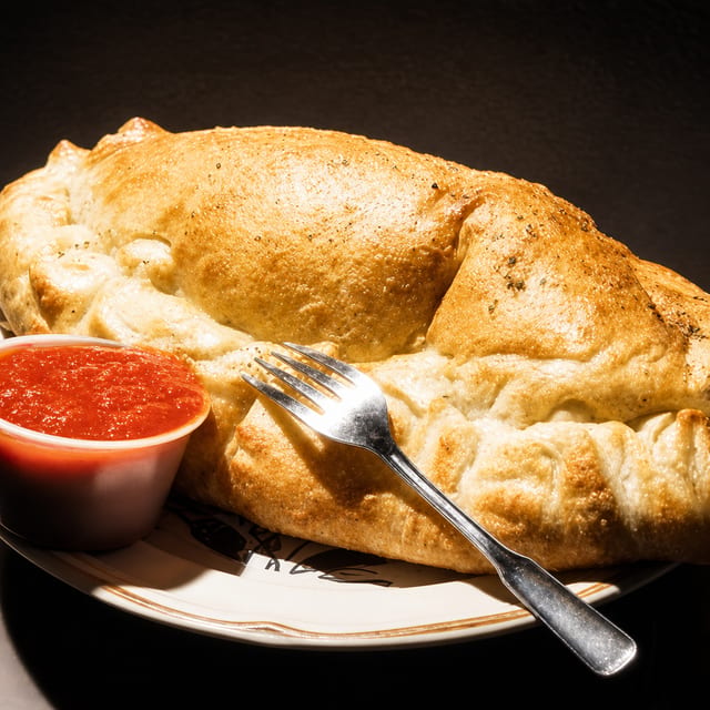 Our Orgasmic Calzone Created by Our Chef From Naples Italy.